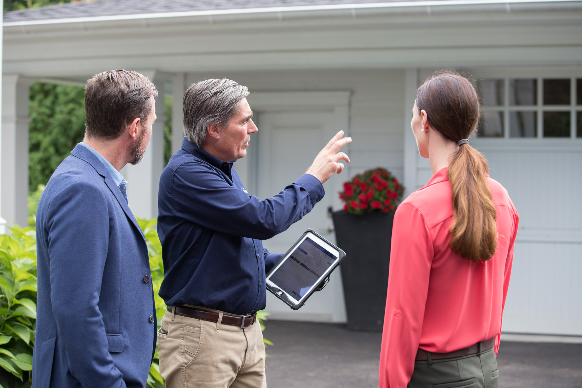 Home Inspector with Home Buyers